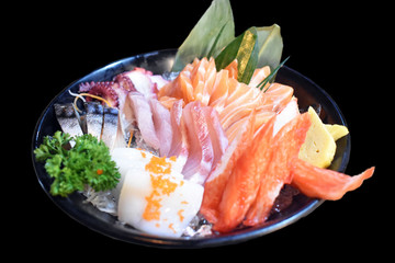 mixed sashimi seafoods on black background, Japanese food