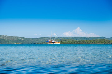 Obraz premium Beautiful old style traditional boat anchored on Adriatic sea in Croatia, Dugi otok archipelago