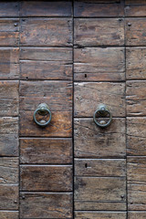 Detail of historic massive wooden door.