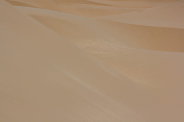 Background desert white sands. Sandy yellow background. Hot, dry, deserted.