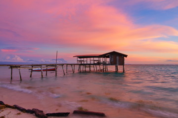 Naklejka premium Beautiful sunset in Mantanani island, Sabah Malaysia. Mantanani island is a famous place for tourism in Malaysia.