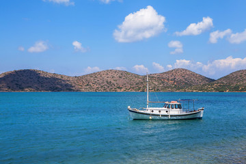 Fototapeta na wymiar Fishing boats in Elounda. Elounda is a small fishing town on the northern coast of the island of Crete, Greece.