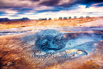 Magical dramatic scene with geothermal swamp and volcanoes  in Hverir (Hverarond) valley  in the Myvatn region. Iceland. Exotic countries. Amazing places.