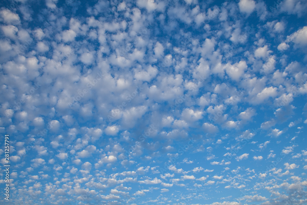 Wall mural blue sky background with clouds