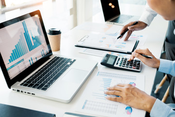 Business People Talking Discussing with coworker planning analyzing financial document data charts and graphs in Meeting and  successful teamwork Concept.