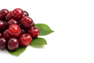 Ripe cherry berries on a white background, close-up