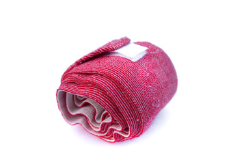 Red elastic bandage on a white background