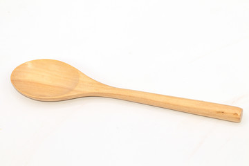 Handmade wooden spoon isolated on white background.