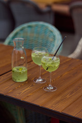 Glass with green summer cocktail