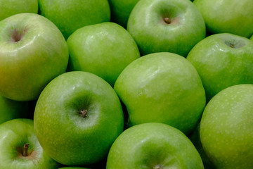 many green apples, flat lay