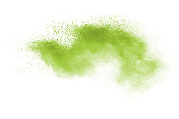 Green powder explosion on white background.