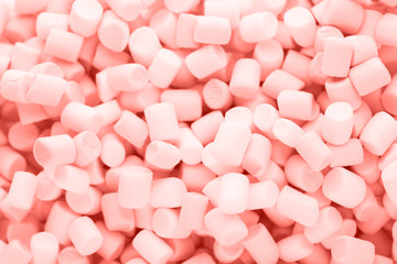 Background or texture of colorful mini marshmallows.