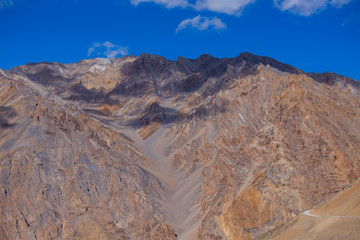Fototapeta na wymiar Himalayan mountain landscape along Leh to Manali highway. Majestic rocky mountains in Indian Himalayas, India
