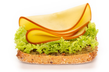 Sandwich with lettuce, cheese on white background.
