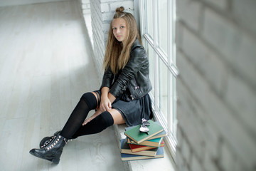 School fashion. Teen girl fashionable in school uniform. 