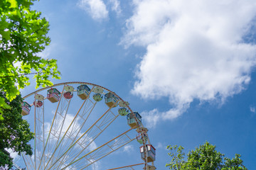 A beautiful old ferris wheel with blue sky background