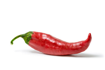 Red hot chili pepper isolated on white background. Spice for a delicious meal.