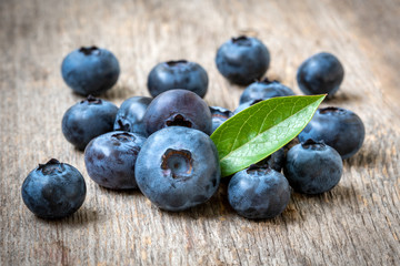 Fresh whortleberry with a green leaf