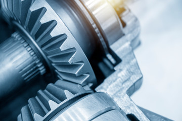 Close-up scene of the differential gear of automotive transmission system.The abstract scene of the drive and pinion gear parts.