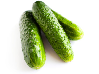 fresh cucumbers on white background, homemade gherkins isolate  
