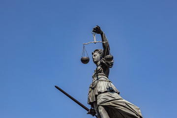 Statue of Lady Justice in front of the Romer in Frankfurt - Germany