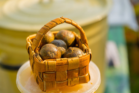 Propolis balls in a small basket on local market. Health products.  Beekeeper Products.