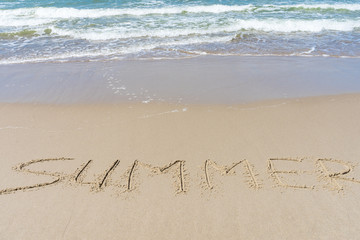 Baltic Sea. The inscription on the sand 