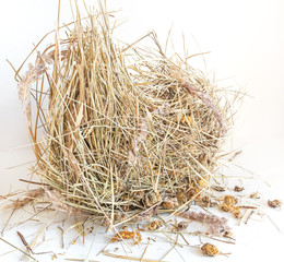 Dry hay isolated. A pile of straw on a white background