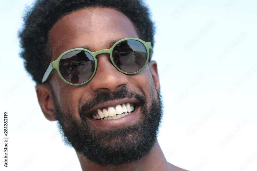 Wall mural Beautiful black man outside