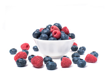 blueberries and raspberries  on white