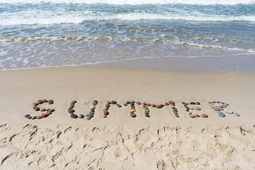 Baltic Sea. The inscription on the sand 