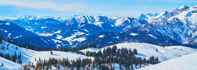 Panorama of snowy Zwieselalm Alpine meadow, Gosau, Austria