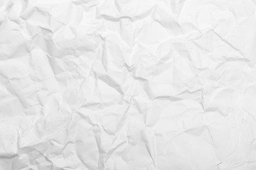 White crumpled paper texture background.