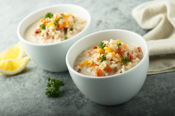 Homemade chowder soup in white bowls