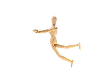 Wooden human toy jump on white background