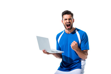 excited soccer player using laptop and cheering Isolated On White