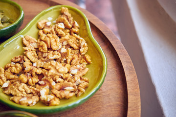 the ceramic avocado plate with delicious walnuts