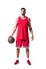 Muurstickers handsome athletic basketball player in red uniform with ball Isolated On White © LIGHTFIELD STUDIOS