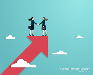 Business women partners handshaking over business