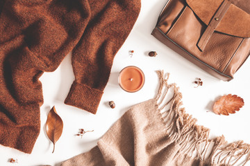 Autumn composition. Autumn clothes on white background. Flat lay, top view