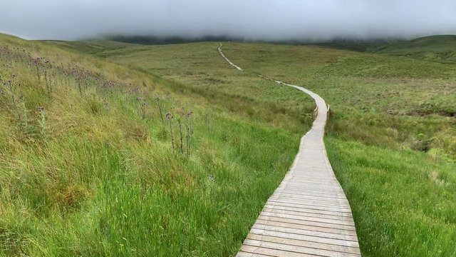 Walking Towards Cuilcagh Mountain On The Boardwalk. 4k 30fps