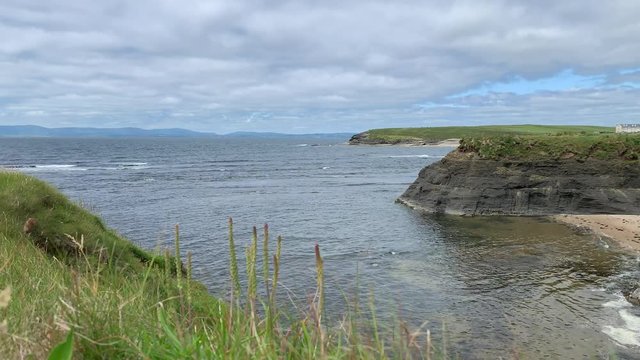 Video of the cliifs overlooking the ocean in Northern Ireland. 4k 30fps