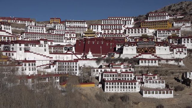 Overview of spectacular renovated Ganden monastery located in mountains near Lhasa, religion and architecture in Tibet