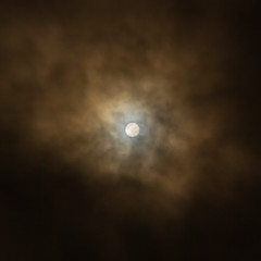 Afternoon Sun Disс Through Heavy Clouds Covered Eye of Summer