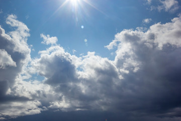 Naklejka na ściany i meble Sun Above Day Cloudy Blue Sky with White Clouds