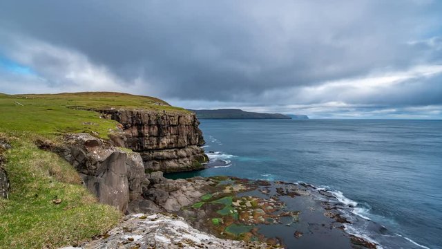 High cliffs near ocean time lapse