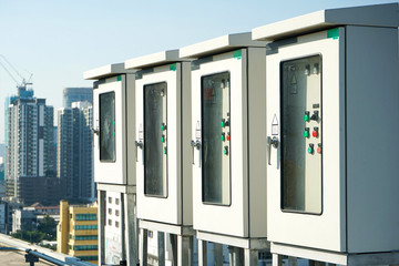 electric box control at the building rooftop with blur building background.