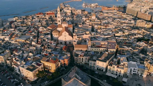 Flying over roof of church in old town of Bari, Italy