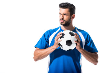 handsome soccer player with ball looking away Isolated On White © LIGHTFIELD STUDIOS