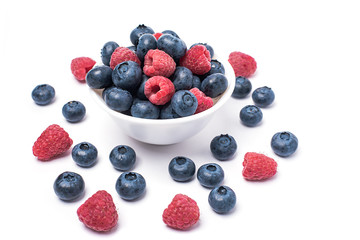 blueberries and raspberries on white